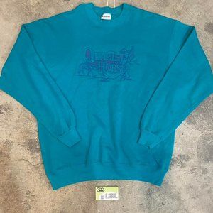 Vintage Teal Sweatshirt with Blue Graphic